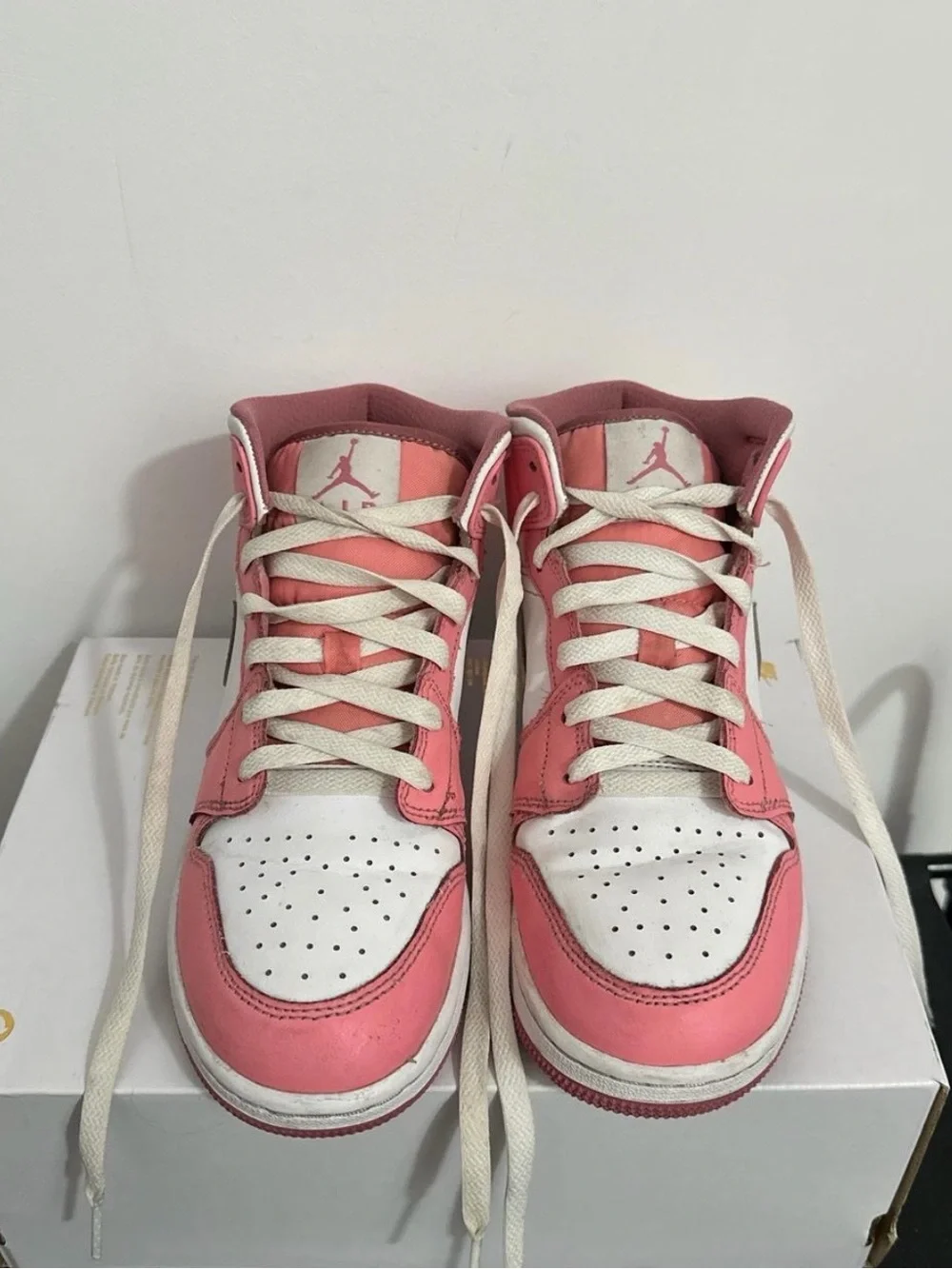 Jordan 1 Kids Pink and White Mid-Top Sneakers with Dark Pink Swoosh